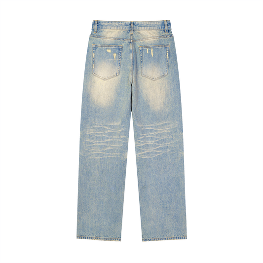 ODMPOD Daybreak Denim Jeans displayed on a hanger, showcasing classic blue denim with a slim fit design.