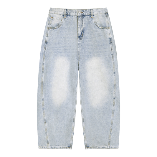 ODMPOD Radius Denim Jeans shown in classic blue, featuring a slim fit design with five-pocket styling and belt loops.