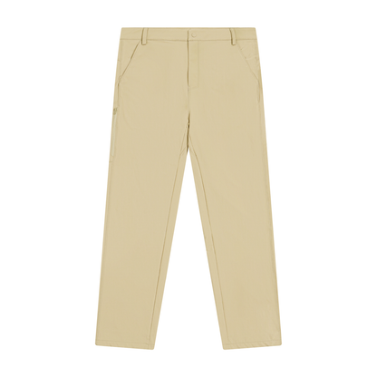 ODMPOD Avenue tapered pants in neutral fabric, featuring a slim fit and classic design, displayed on a hanger.