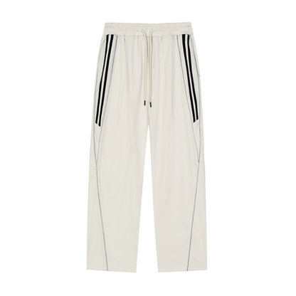 ODMPOD Motion Sweatpants in black showing their relaxed fit and elastic waistband, made from comfortable, lightweight fabric.