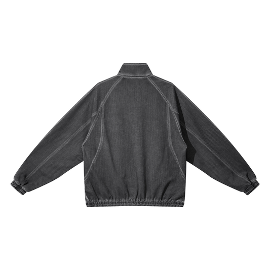 ODMPOD Eclipse Jacket shown in image, featuring sleek black design and lightweight fabric for stylish outdoor wear.