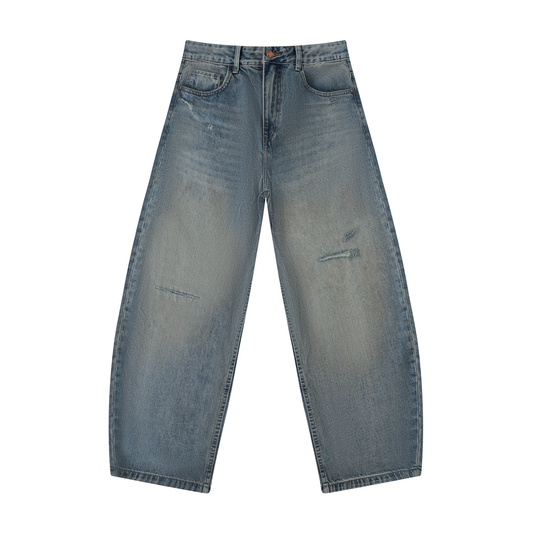 ODMPOD Nomad Denim Jeans showing classic fit with five-pocket design and distressed detailing in dark blue denim fabric.